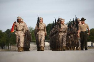 Senior drill instructor of Platoon 1042, Alpha Company, 1st Recruit Training Battalion, leads his platoon during their final drill evaluation. (Photo by Lance Cpl. MaryAnn Hill)