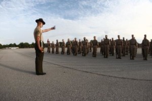 Staff Sgt. Fredy Herrera, Senior Drill Instructor of Platoon 1042, Alpha Company, 1st Recruit Training Battalion, reads a drill card before giving his recruits their next command during their final drill evaluation June 5, 2013, on Parris Island, S.C. (Photo by Lance Cpl. MaryAnn Hill)