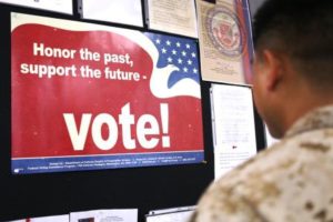 Posters encouraging Marines to engage the political systems hang in various locations throughout Marine Corps Base Camp Lejeune.