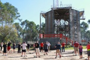 Educators with Recruiting Station Harrisburg prepare to descend on the reppel tower during the Educators’ Workshop, at Recruit Training Depot Parris Island, March 10, 2016. The reppel tower is one of many challenges recruits must overcome before earning the title of Marine (Photo by Cpl. Brandon Thomas)