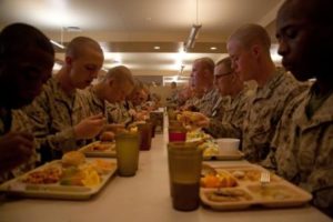 Recruits eat a hot meal. Recruits recieve three meals each day in training. (Photo by Lance Cpl. David Bessey)