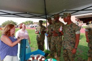 Members of Pvt. Pepper’s Lonely Hearts Club provides refreshments and friendly faces to Marines without family or friends on Family Day. (U.S. Marine Corps photo by Staff Sgt. Tyler Hlavac)