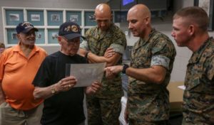 Drill instructors and command leadership from 2nd Recruit Training Battalion enjoy fellowship with Marines from the Parris Island Recruit Training graduating class of 1955 at the Brig and Brew. (U.S. Marine Corps photo by Lance Cpl. Ryan Hageali)